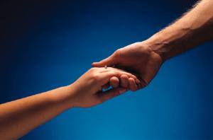 hands reaching to each other